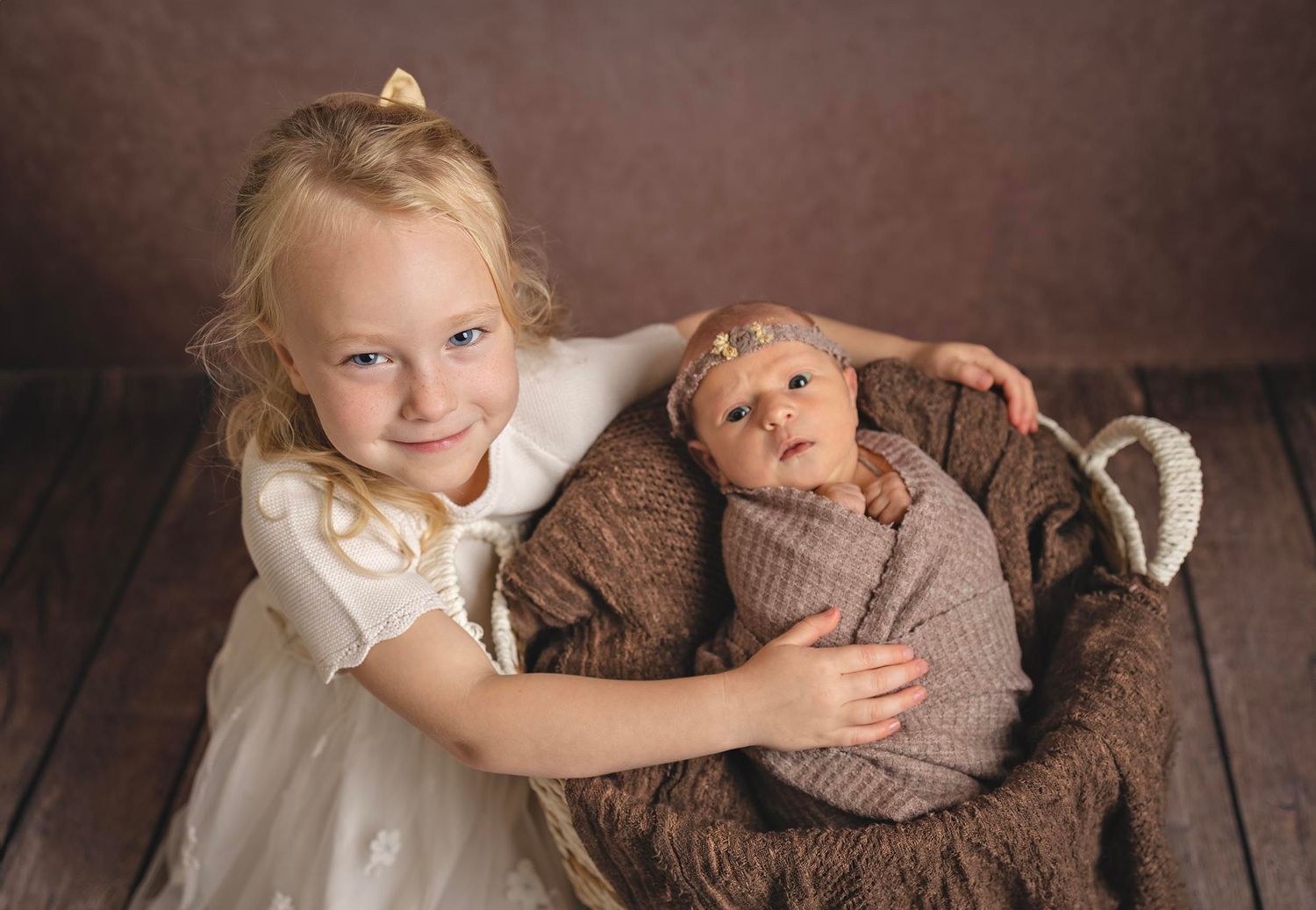 Two young children in a professional studio portrait, Newborn photographer in Gosport Hampshire, Newborn photos in Fareham, baby photography