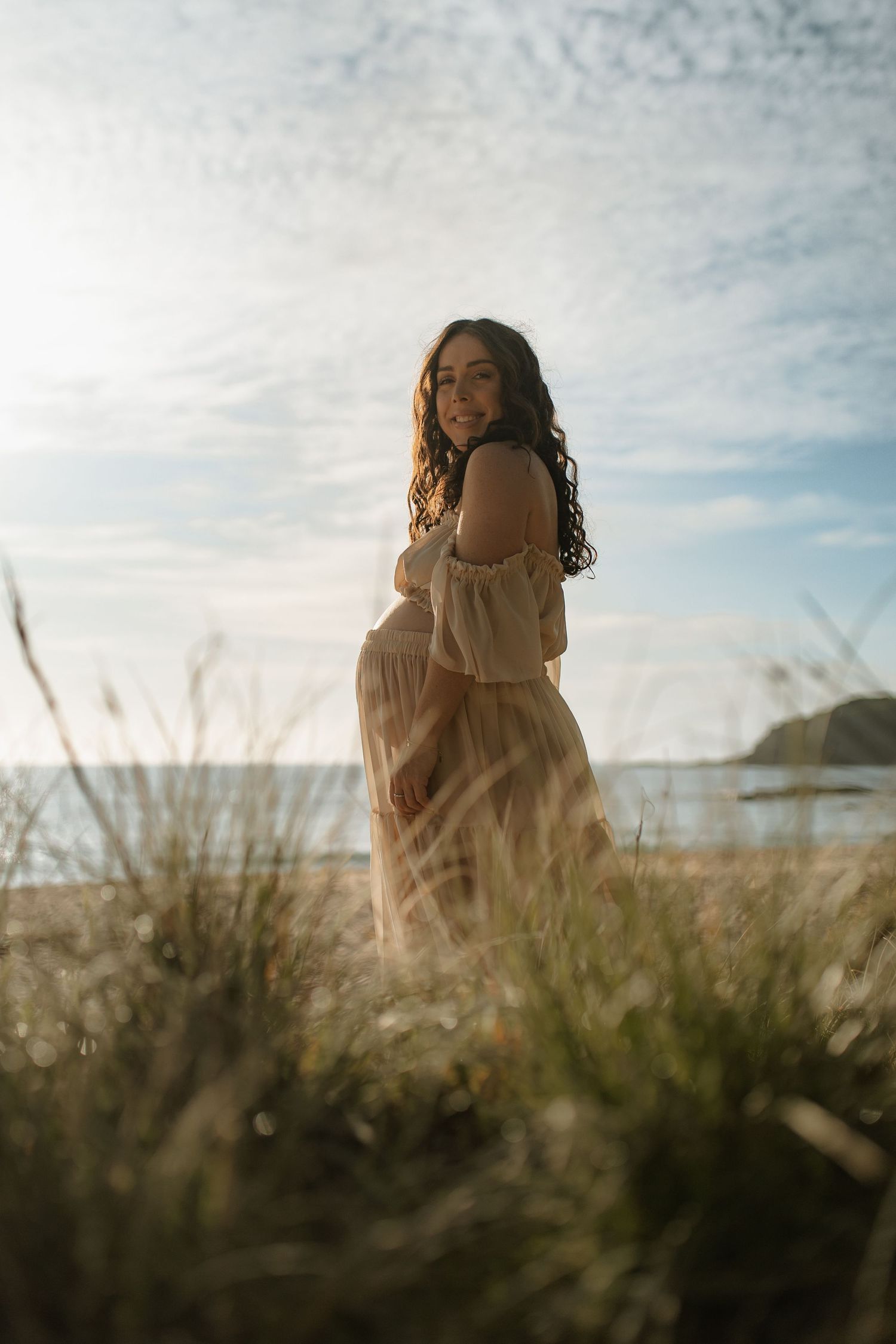 Sunrise maternity shoot in client closet dress