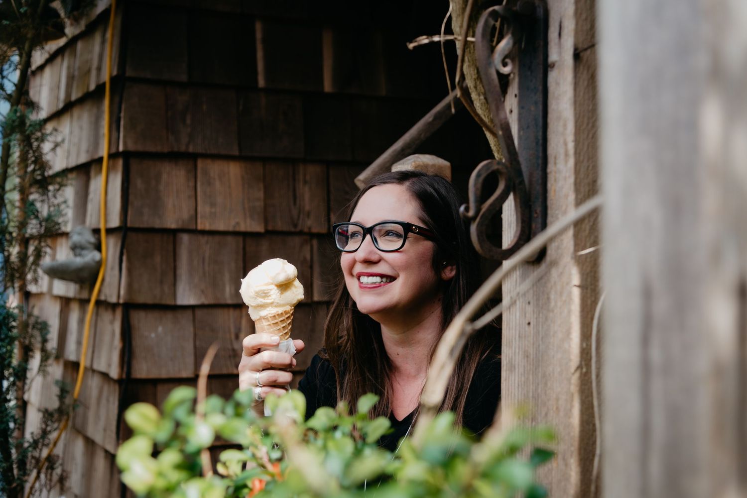 Woman enjoys goat milk ice cream at Salt Spring Island Cheese Farm