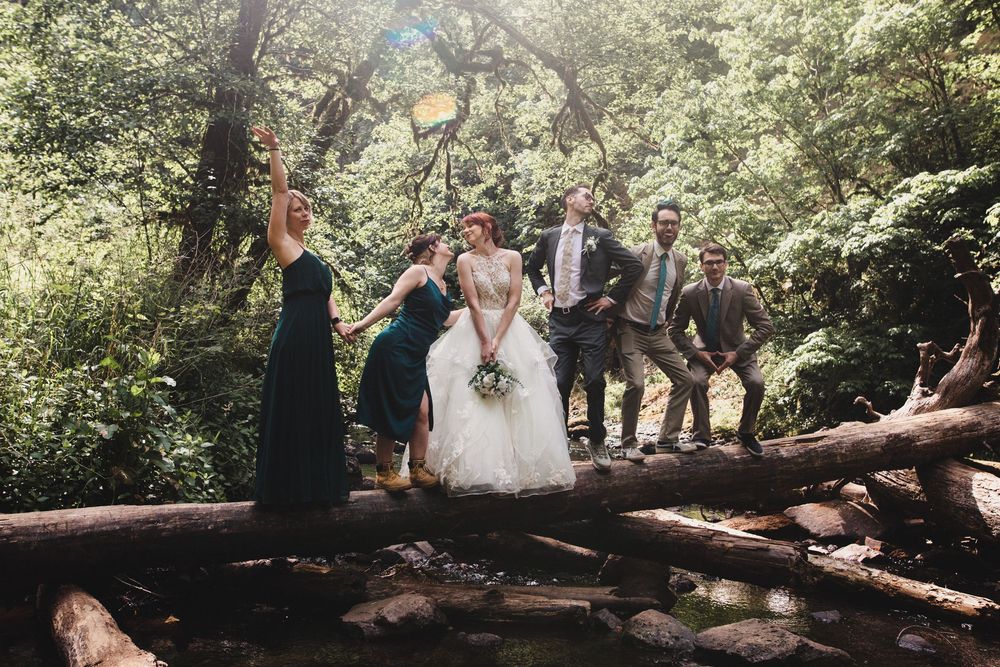 A sequence of intimate outdoor forest wedding moments captured in natural light beneath towering trees in a woodland setting.