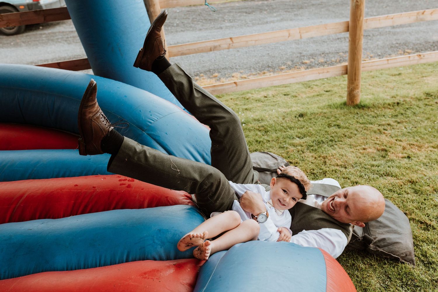 Groom and page boy falling off ride of bull at Stanford Farm