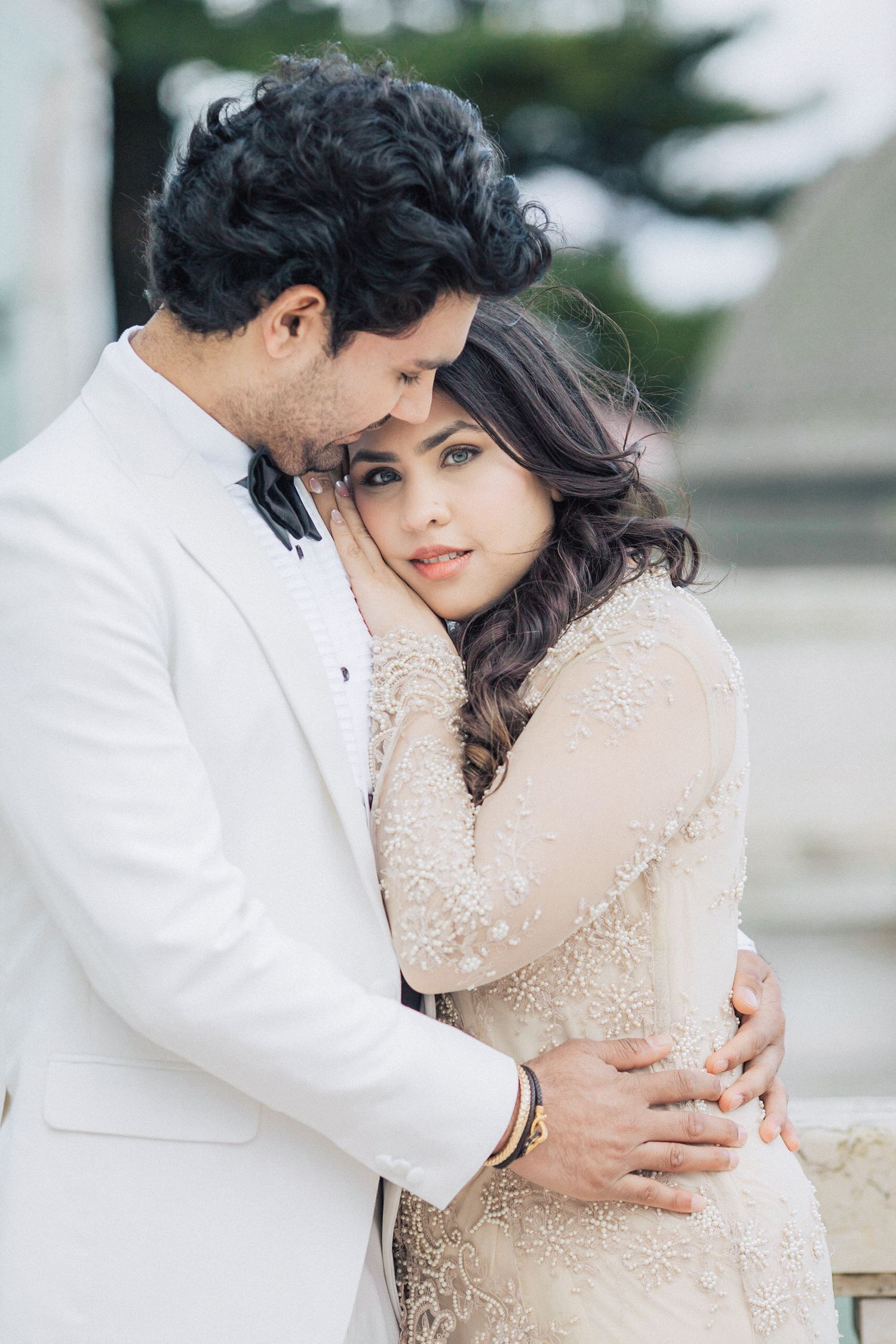 Romantic and sophisticated couple posing in the grand surroundings of Pestana Palace, Lisbon