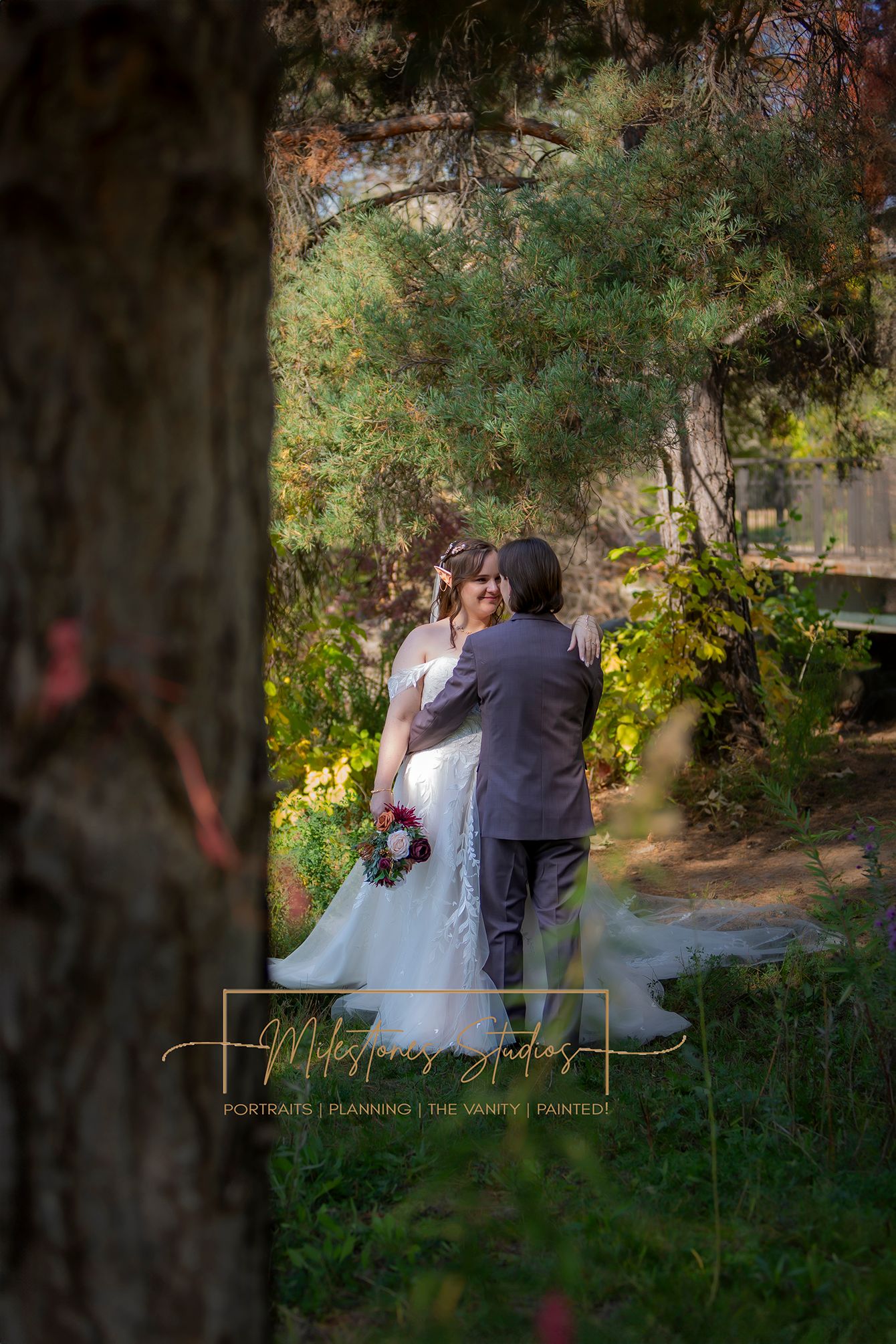 paparazzi view of bride and groom in forest intimate setting