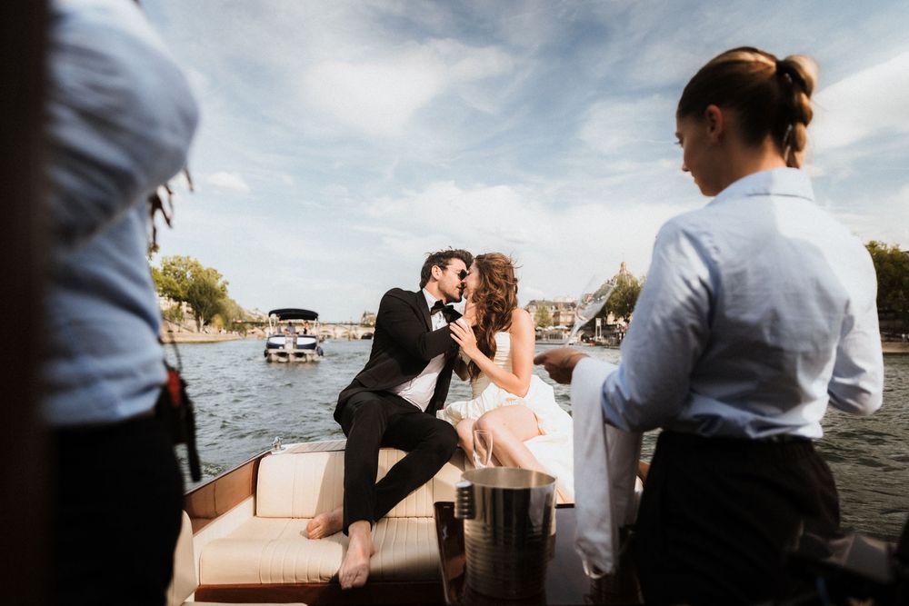 Romantic silhouettes of couples in wedding attire pose against dramatic skies at sunset in varying frames.