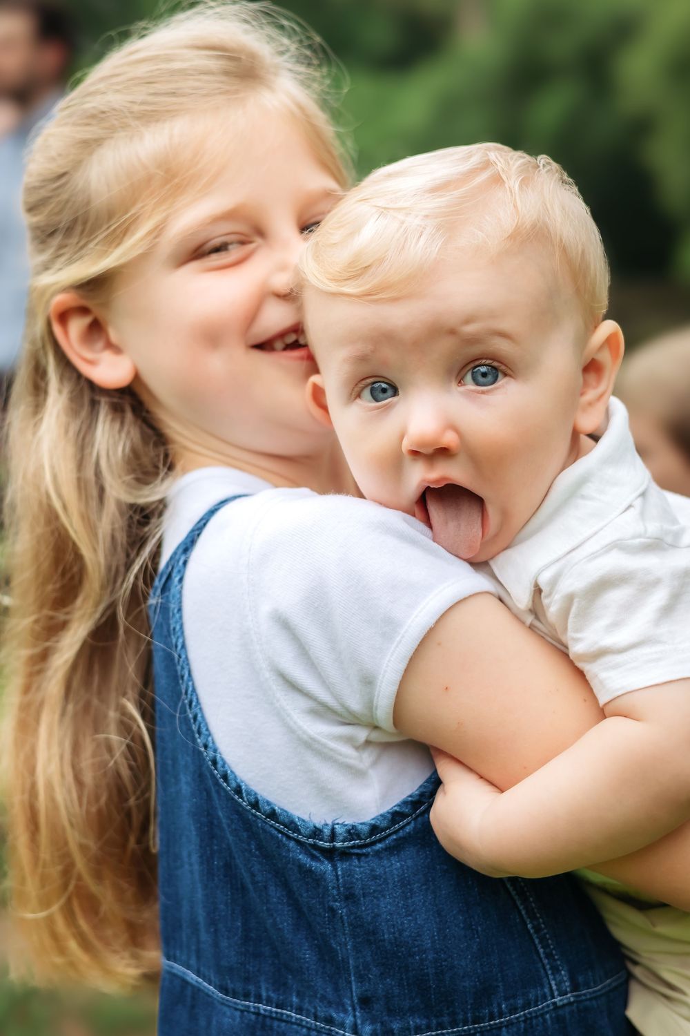 Children from extended family session smiling together during outdoor photoshoot in Athens GA