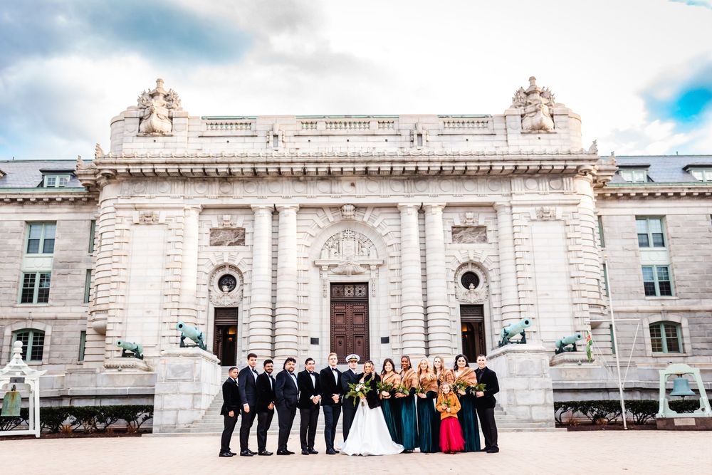 Panoramic view of historic grand white mansion with ornate architectural details and elegant classical colonnade details.