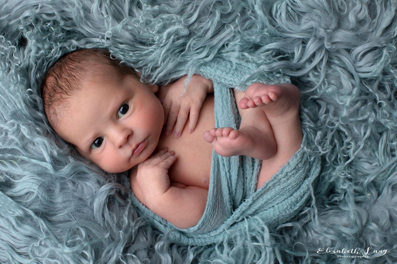 baby in blue mini newborn sessions Surrey studio photography Elizabeth Lang Photography. Short baby photo shoot with minimal stress.
