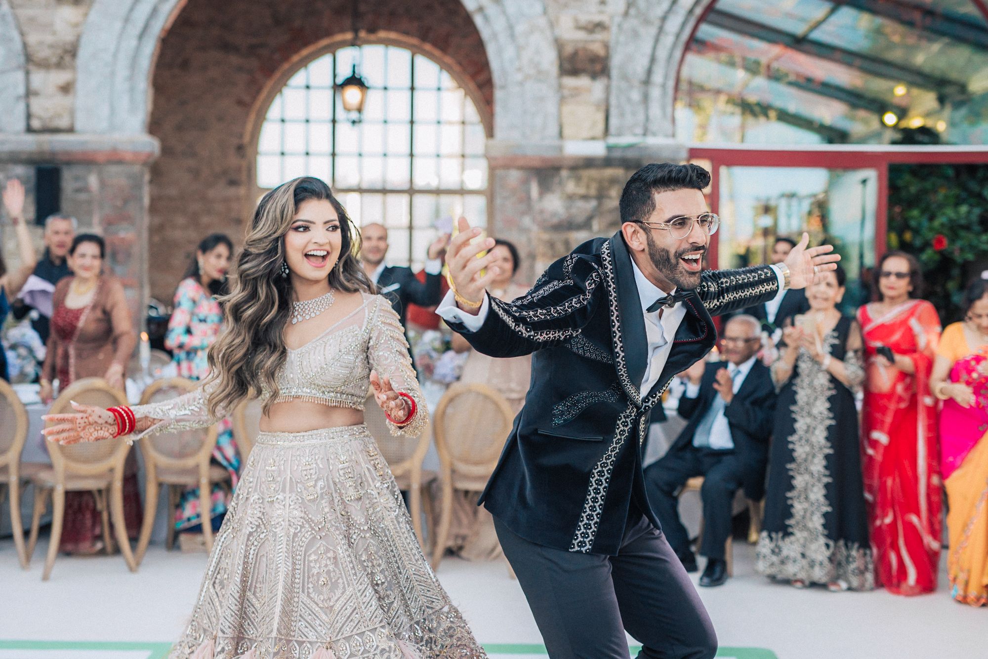 A magical Indian wedding reception at Forte da Cruz, overlooking the Atlantic Ocean. by a Lisbon Wedding Photographer