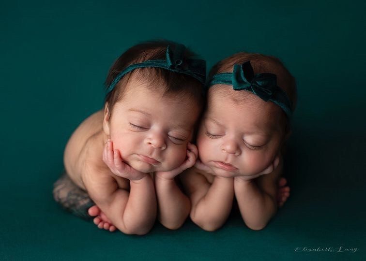 Newborn baby girl froggy pose from Elizabeth Lang Photography in Surrey.