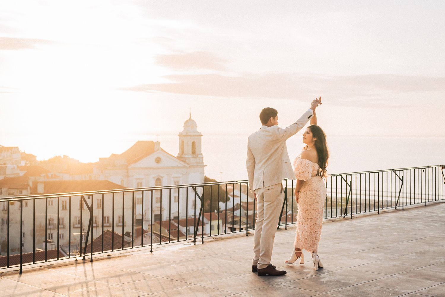 Romantic engagement photoshoot of an indian couple at the historical city of Lisbon during a Destination Wedding in Portugal