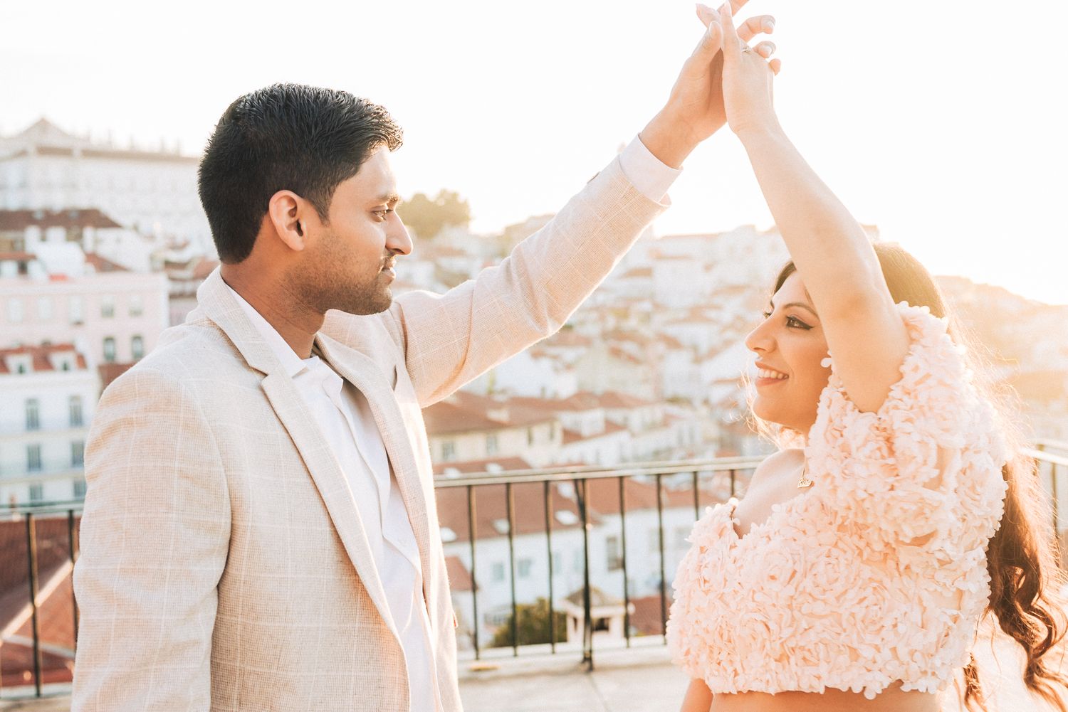 Romantic engagement photoshoot of an indian couple at the historical city of Lisbon during a Destination Wedding in Portugal