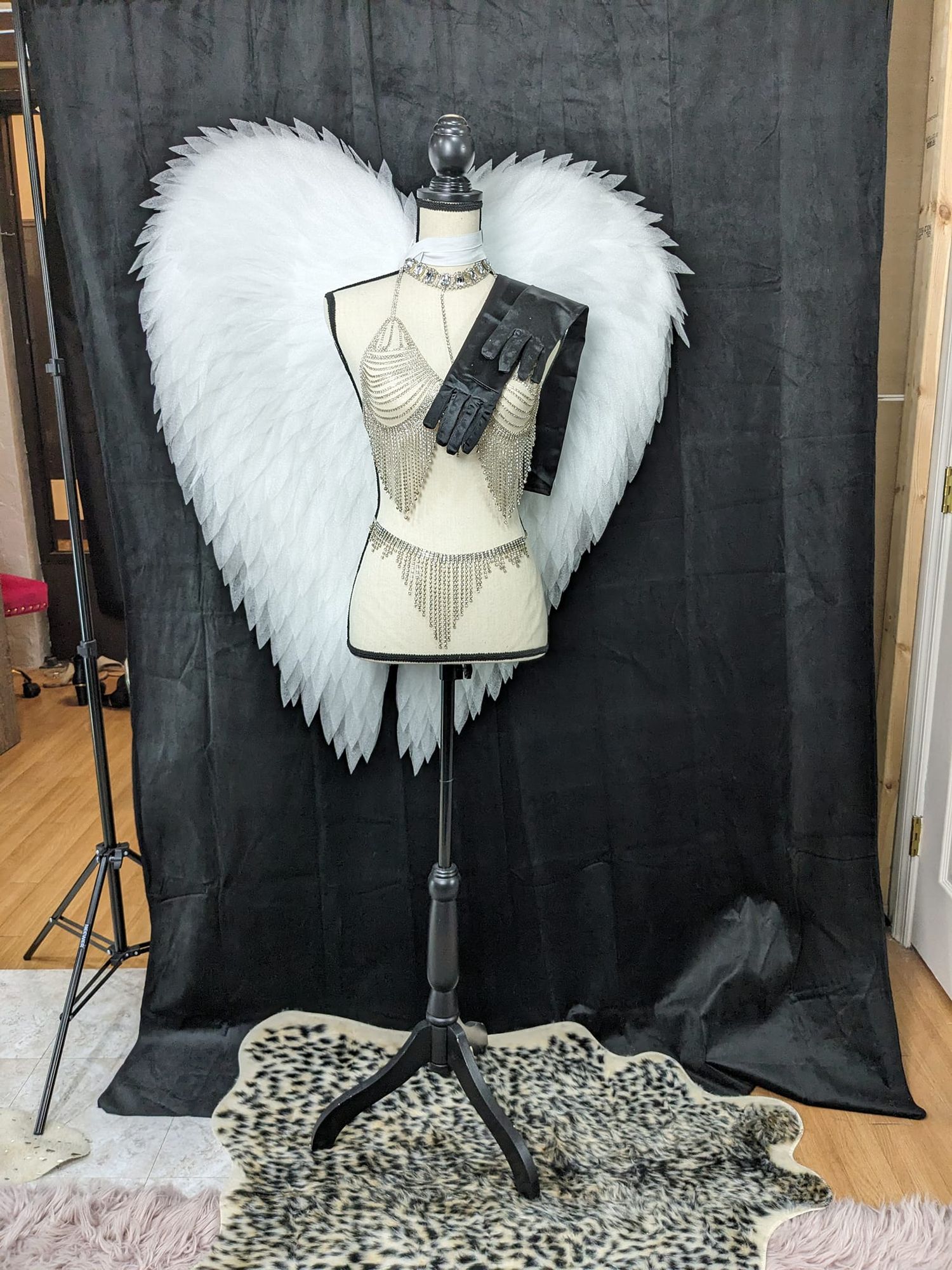 Angel wings boudoir set on display | Luxe set design at R.H.L Boudoir, Venice, FL