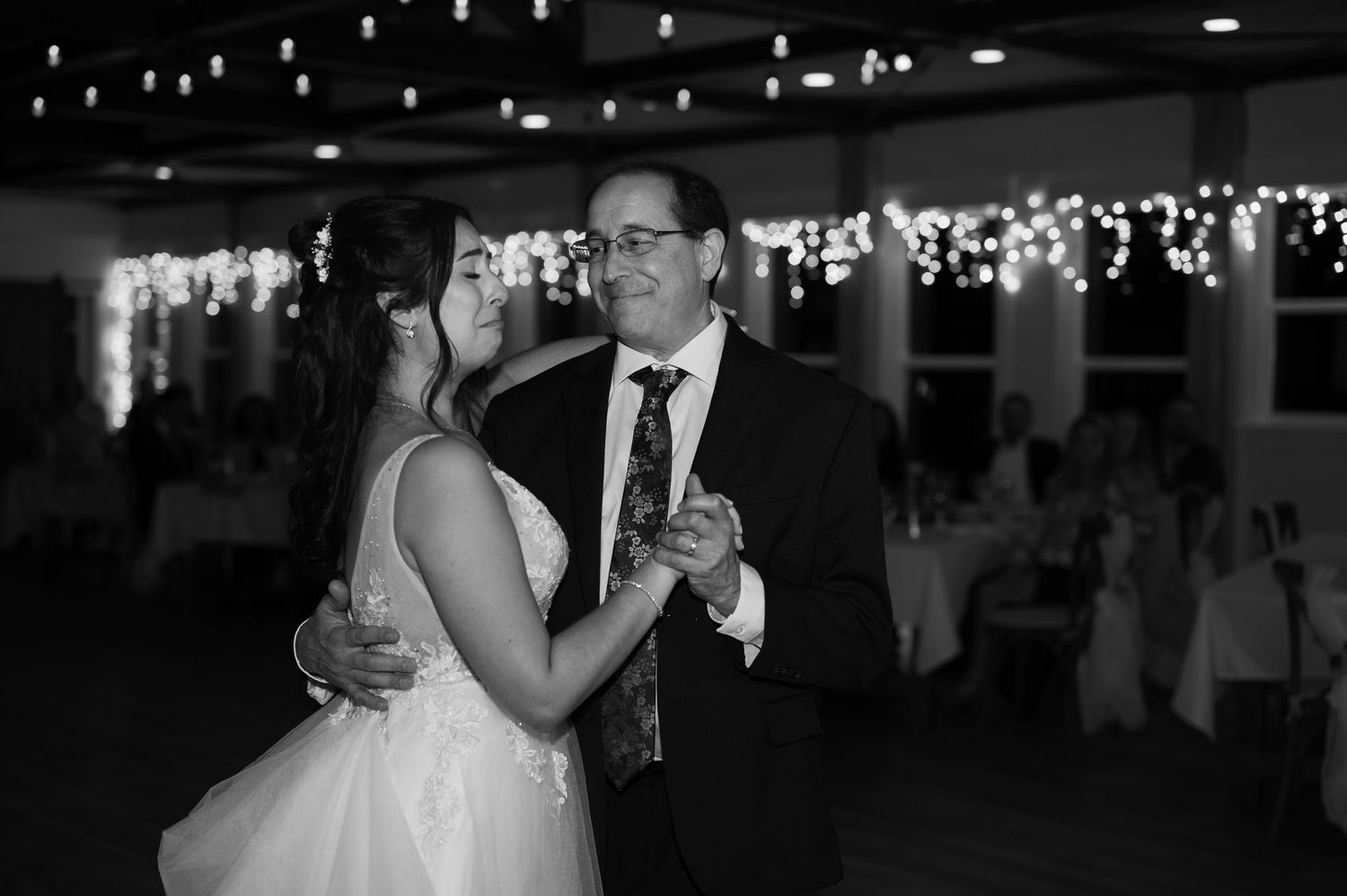 Guests dancing energetically at a Florida wedding reception.