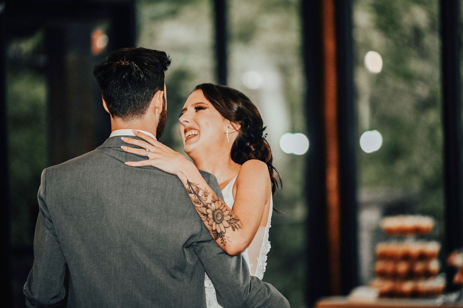 bride and groom sharing their first dance at the lodge at the springs wedding venue in aubrey texas