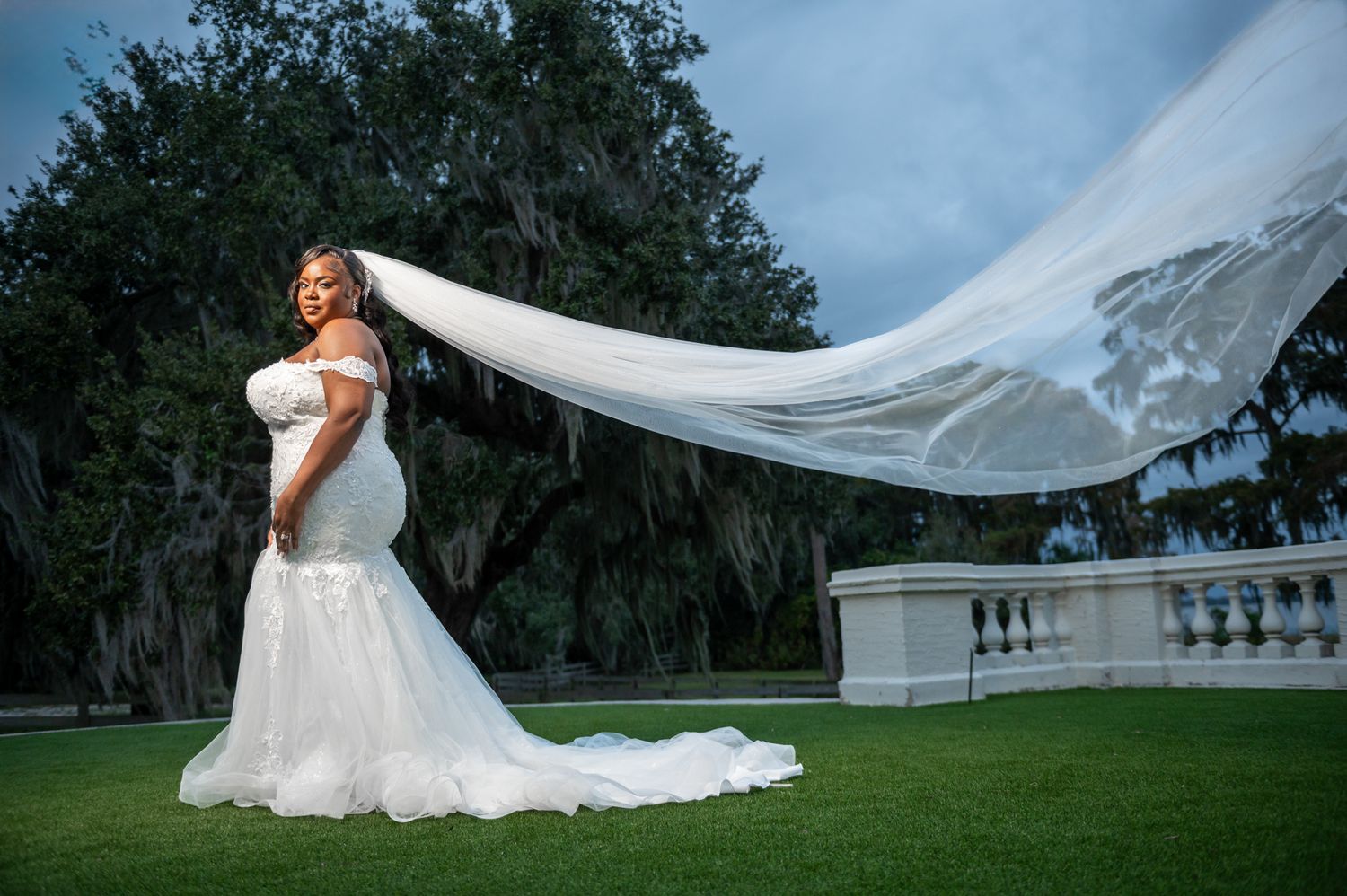 Bride getting ready in Bella Cosa’s villa suite, captured in soft natural light by a luxury wedding photographer in Florida.