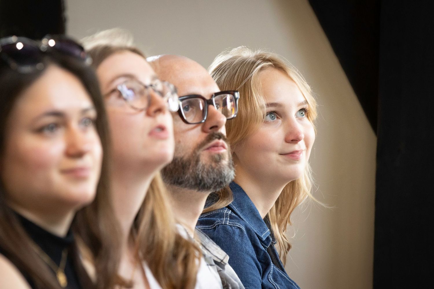 York Civic Trust corporate event photography. Attentive audience members watching presentation at York Hospitium conference room.