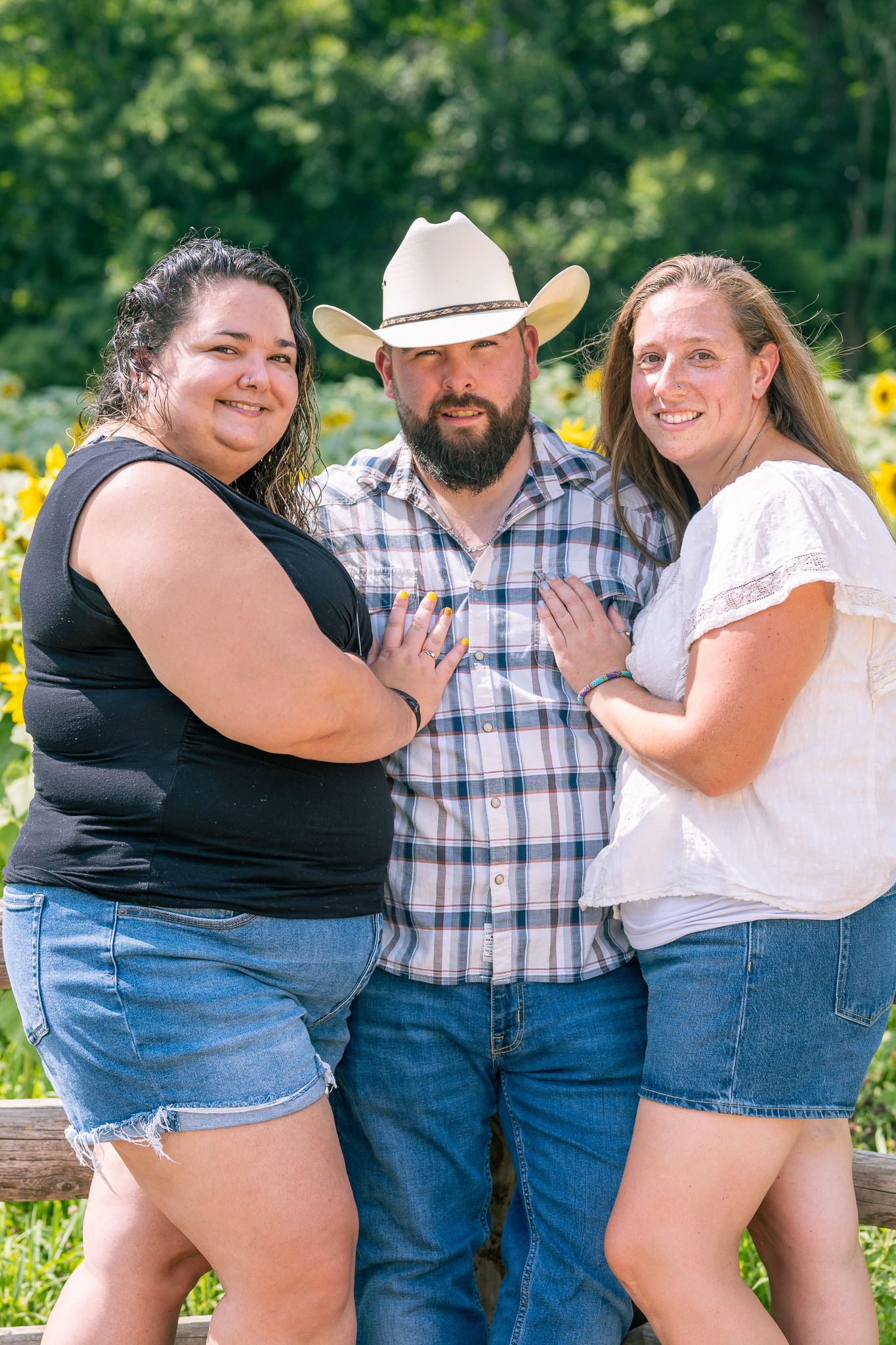 Group of 3 posing during Sunflower Mini-Sessions