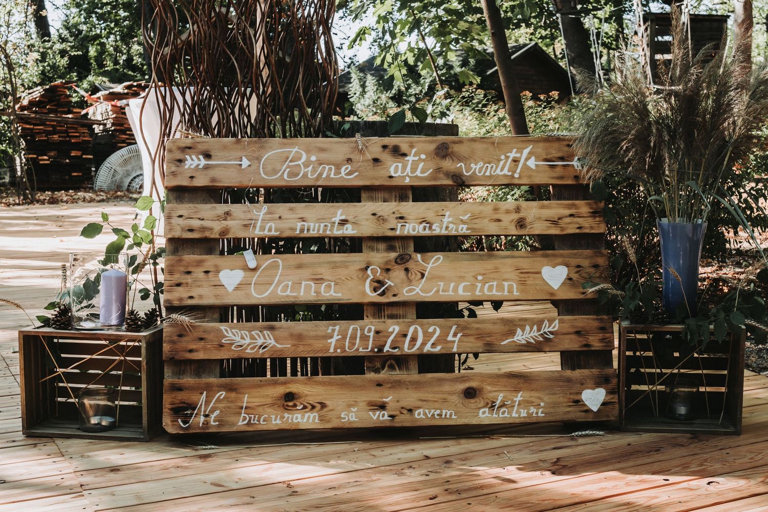 Rustic wooden backdrop with elegant calligraphy text for wedding decor.