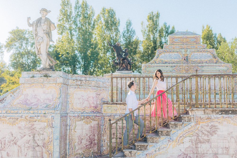 Engagement phooshoot of a couple at the historic Queluz Palace in Portugal. captured by a Portugal wedding photographer
