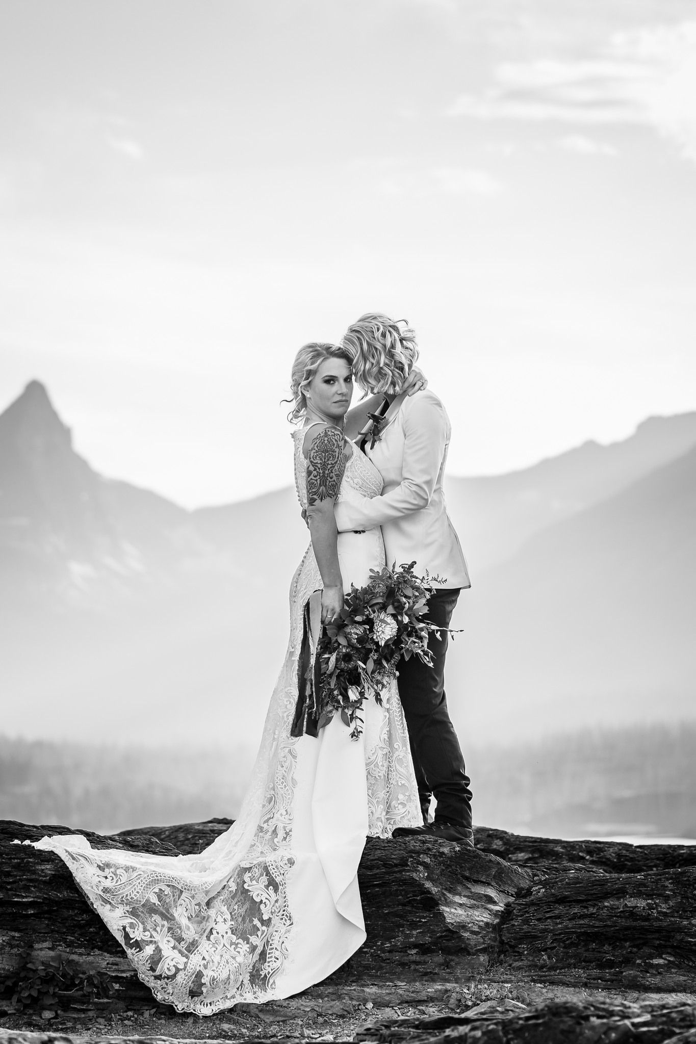LGBTQ Glacier National Park Elopement Black and white couple on mountains