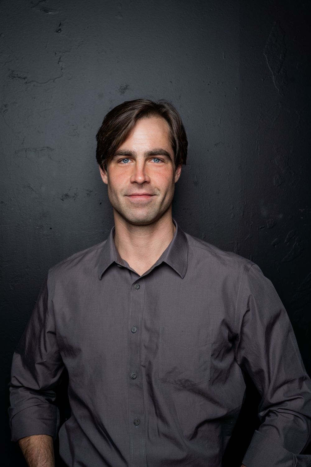 Dark background branding head shot portrait work.