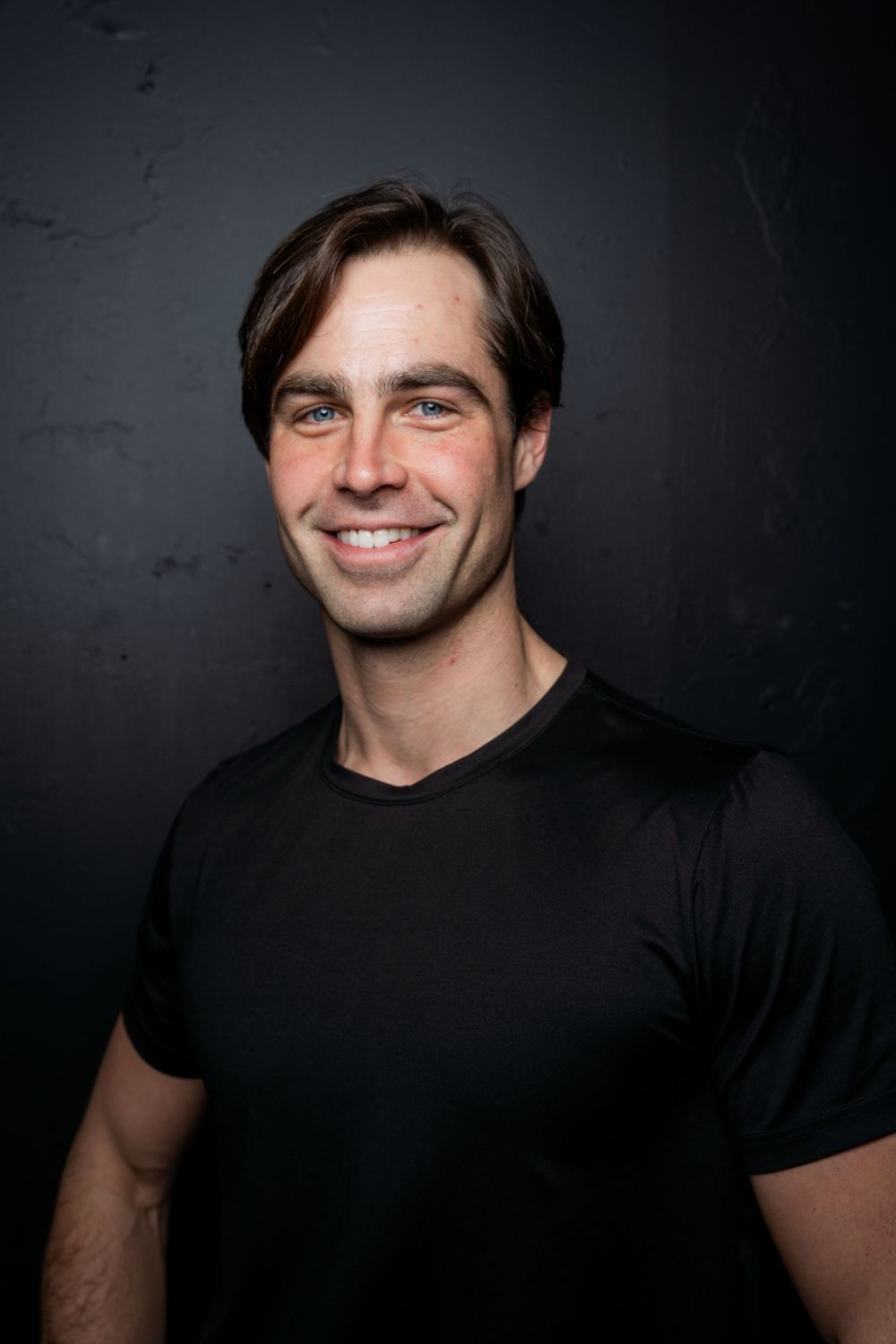 Dark background branding head shot portrait work.
