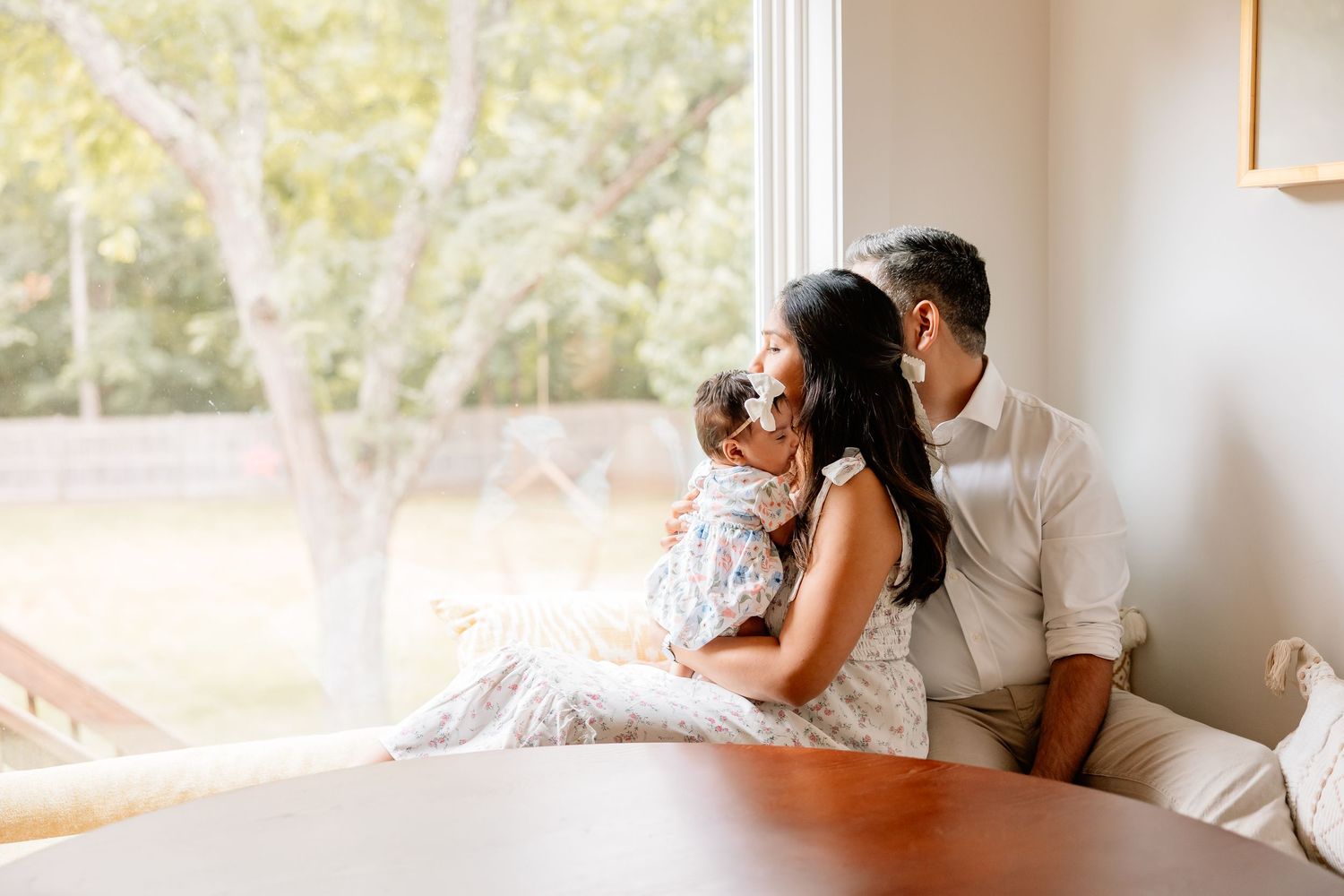 A couple shares intimate moments in multiple candid wedding photos displayed in a horizontal collage.