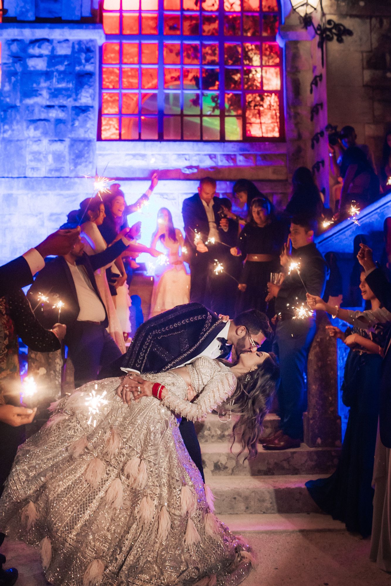 A magical Indian wedding reception at Forte da Cruz, overlooking the Atlantic Ocean. by a Lisbon Wedding Photographer