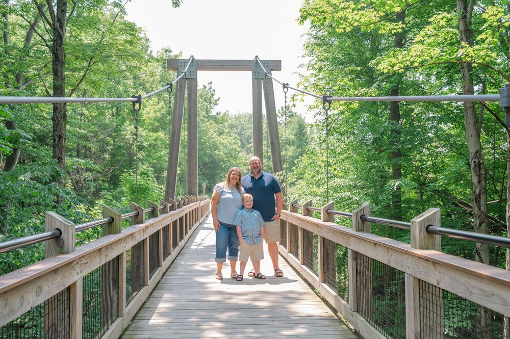 family on suspension bridge