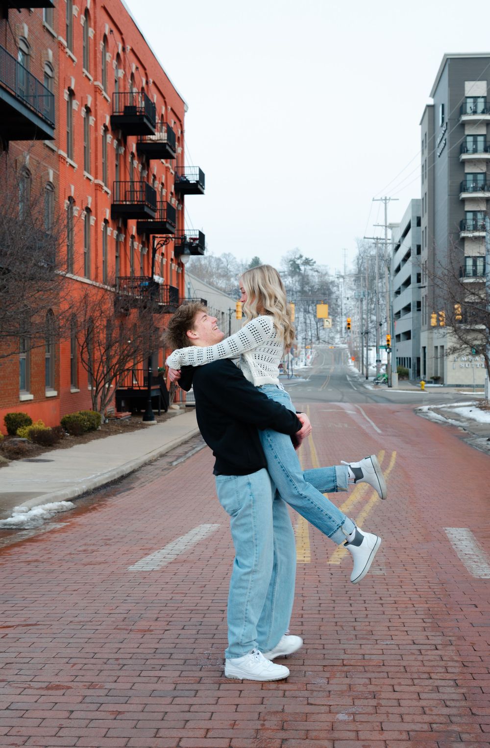 boyfriend picking up girlfriend