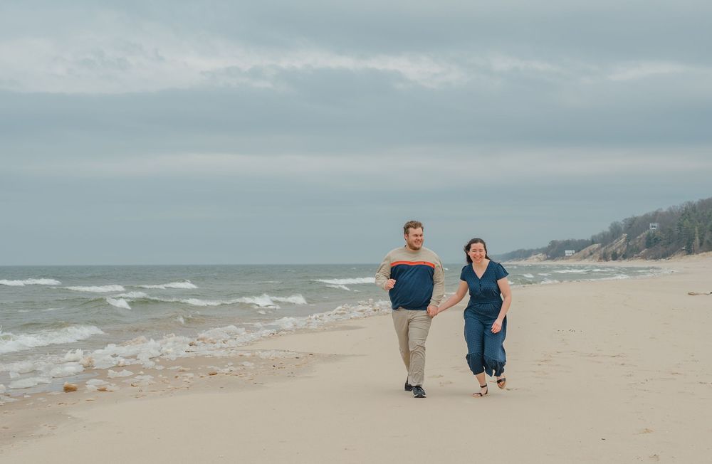couple running on beach