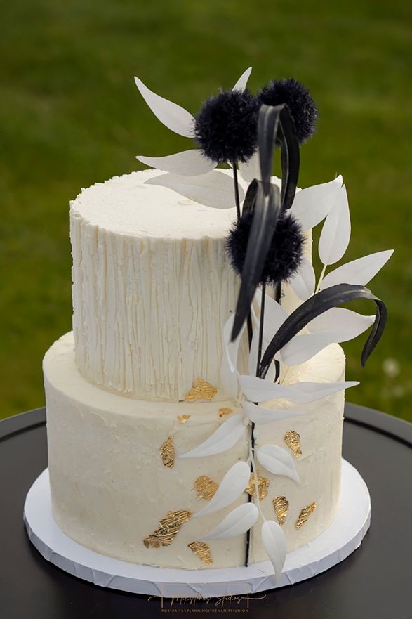 Cakes by Blythe, creamy white cake with black and white florals and gold details