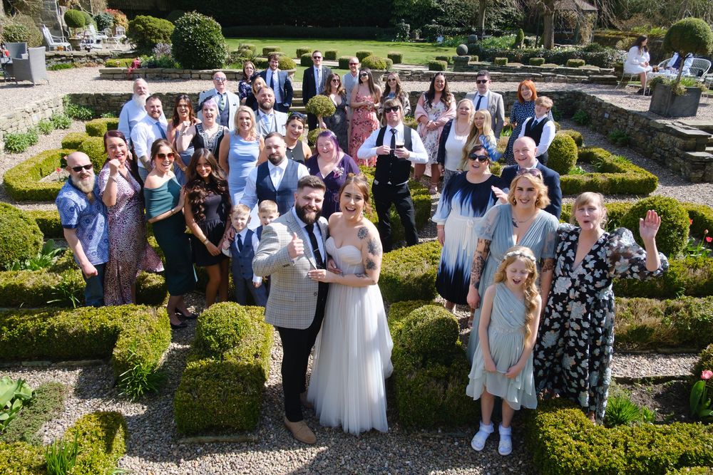 Bride, Groom and all the guests at Holdsworth House, Halifax