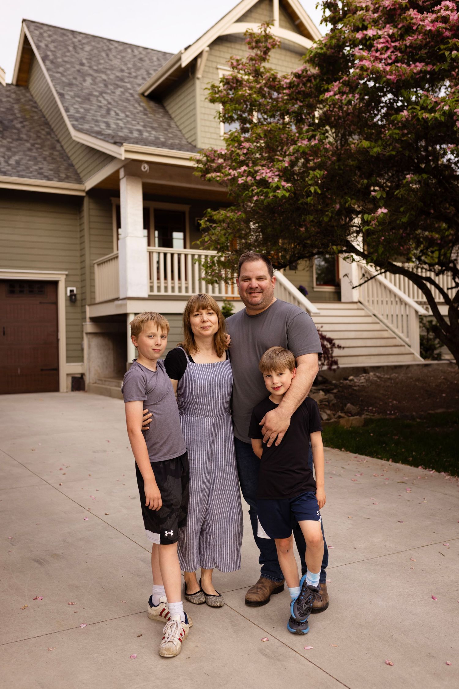Photos in your own garden or front yard add a special sentimental touch and even more meaning to your family portraits. Surrey.