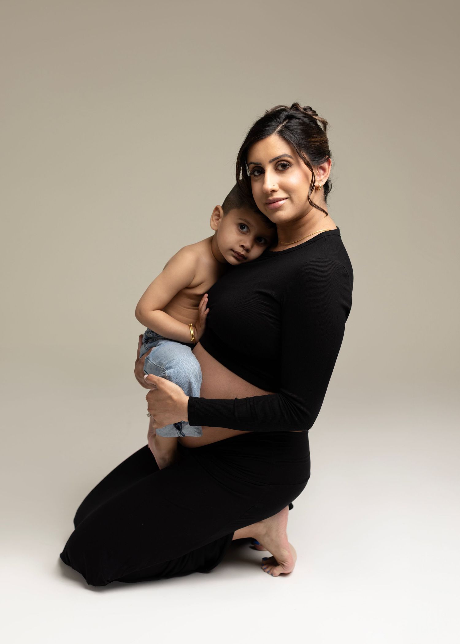 Gorgeous Rumneet awaits her new baby's arrival. Cloverdale. Surrey. Maternity Photography bump photos. Sleek black dress with cutout.