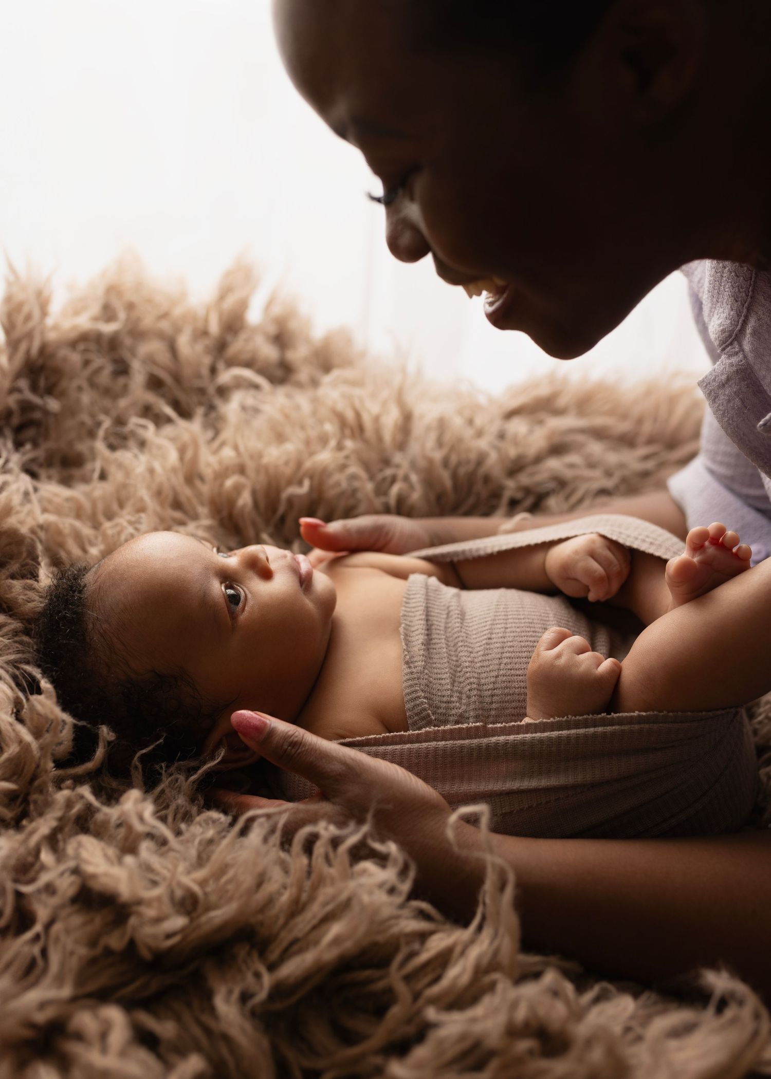 Mom smiles lovingly at Jesse. I’m so grateful Raven trusted me to photograph her sweet boy. Jesse’s images are filled with warmth, personali