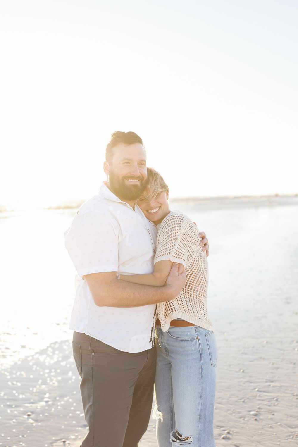 Siesta Key proposal captured at sunset with airy sky