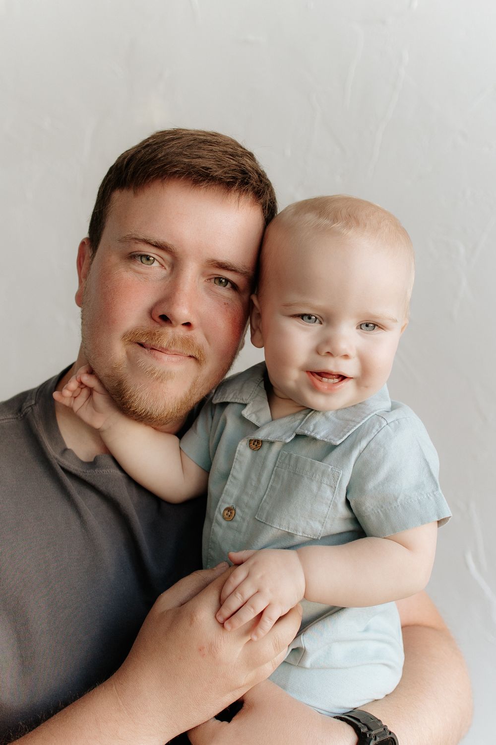 A sweet moment captured in four sequential photos showing a loving embrace in soft, muted tones.