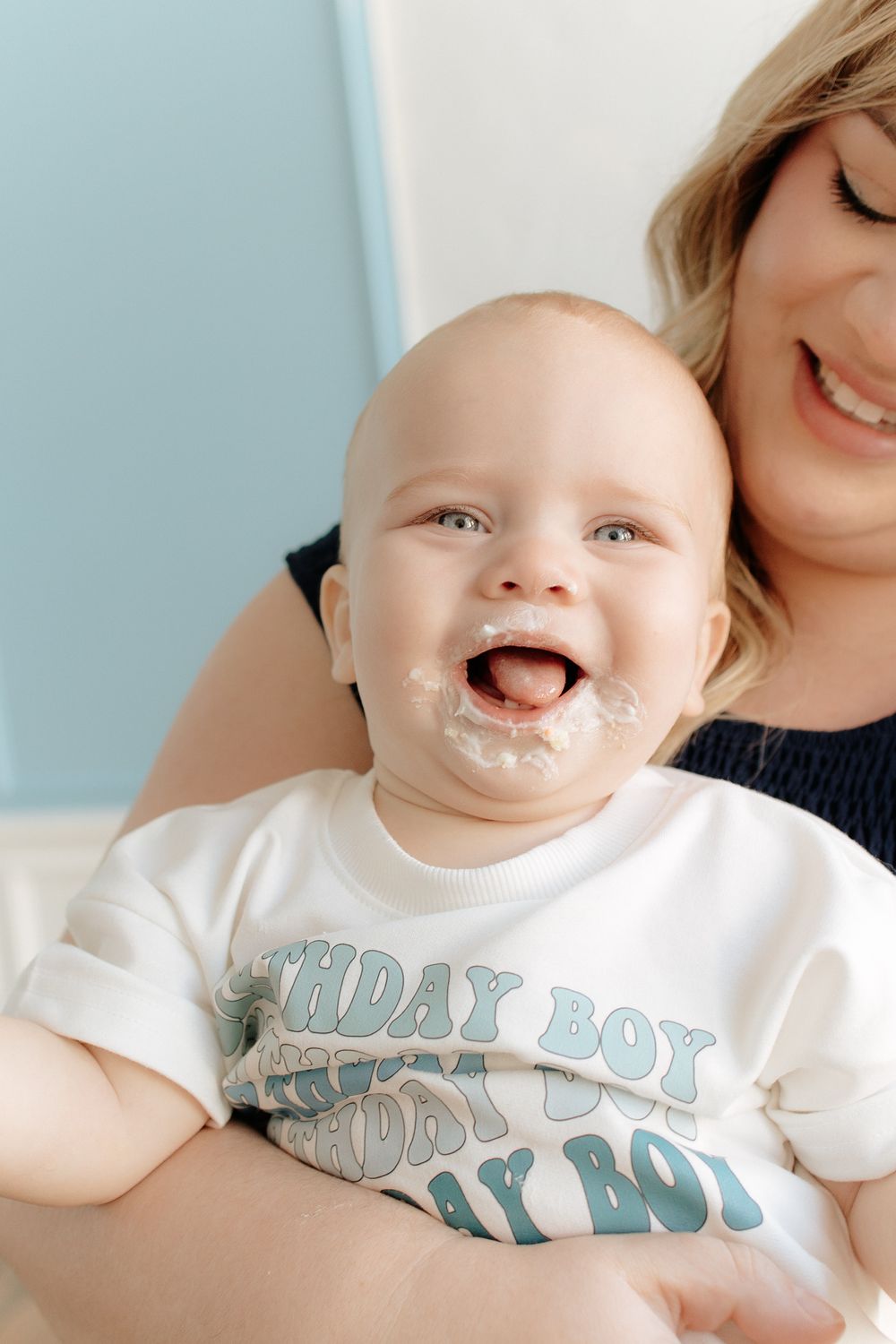 A split image sequence shows a smiling baby wearing a 'Beast Boy' t-shirt against a white background.