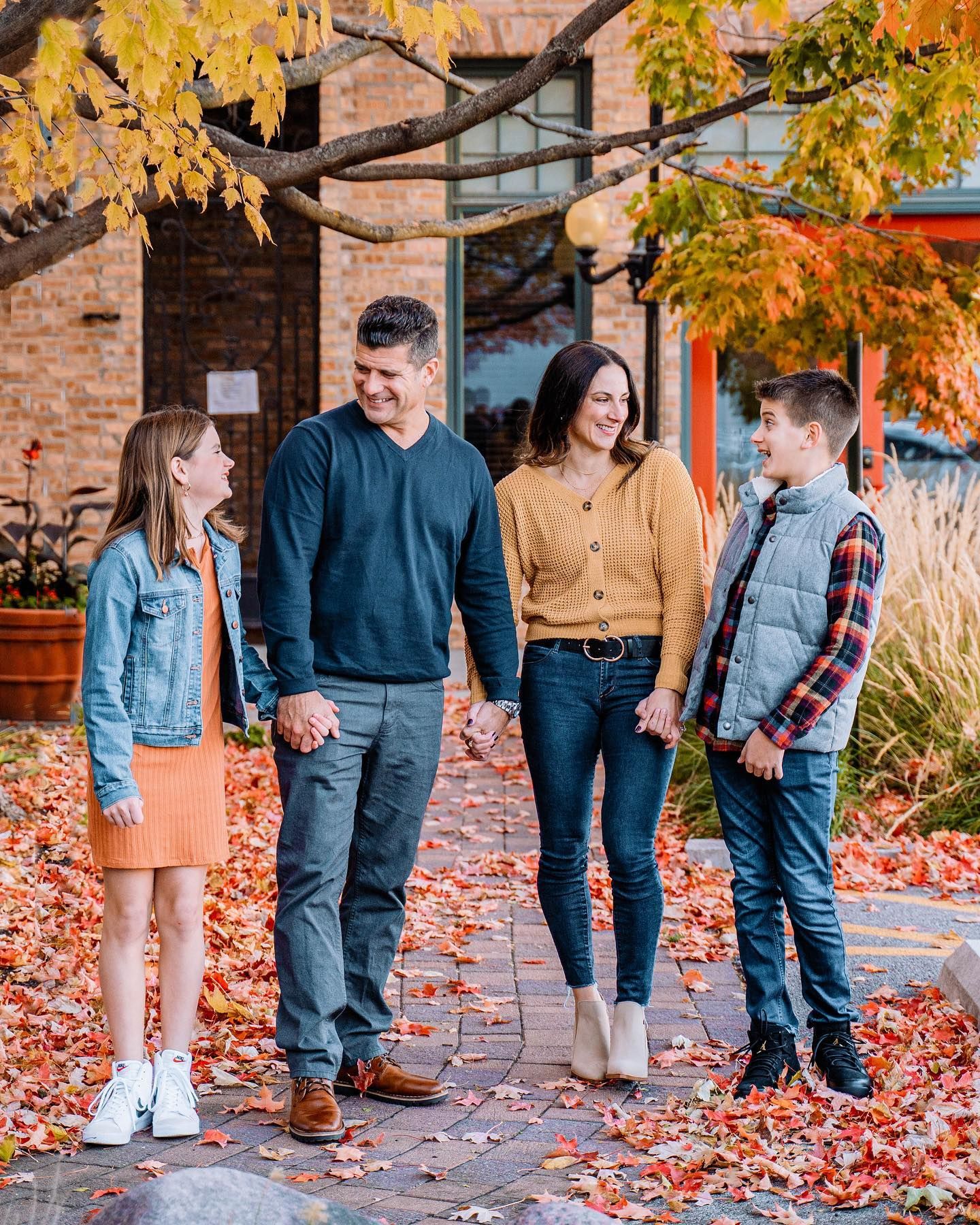 Surrounded by autumn leaves and golden hour family session makes beautiful memories.