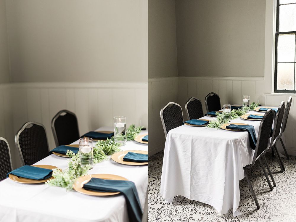 Wedding reception table set with white linens, blue plates and greenery centerpieces.