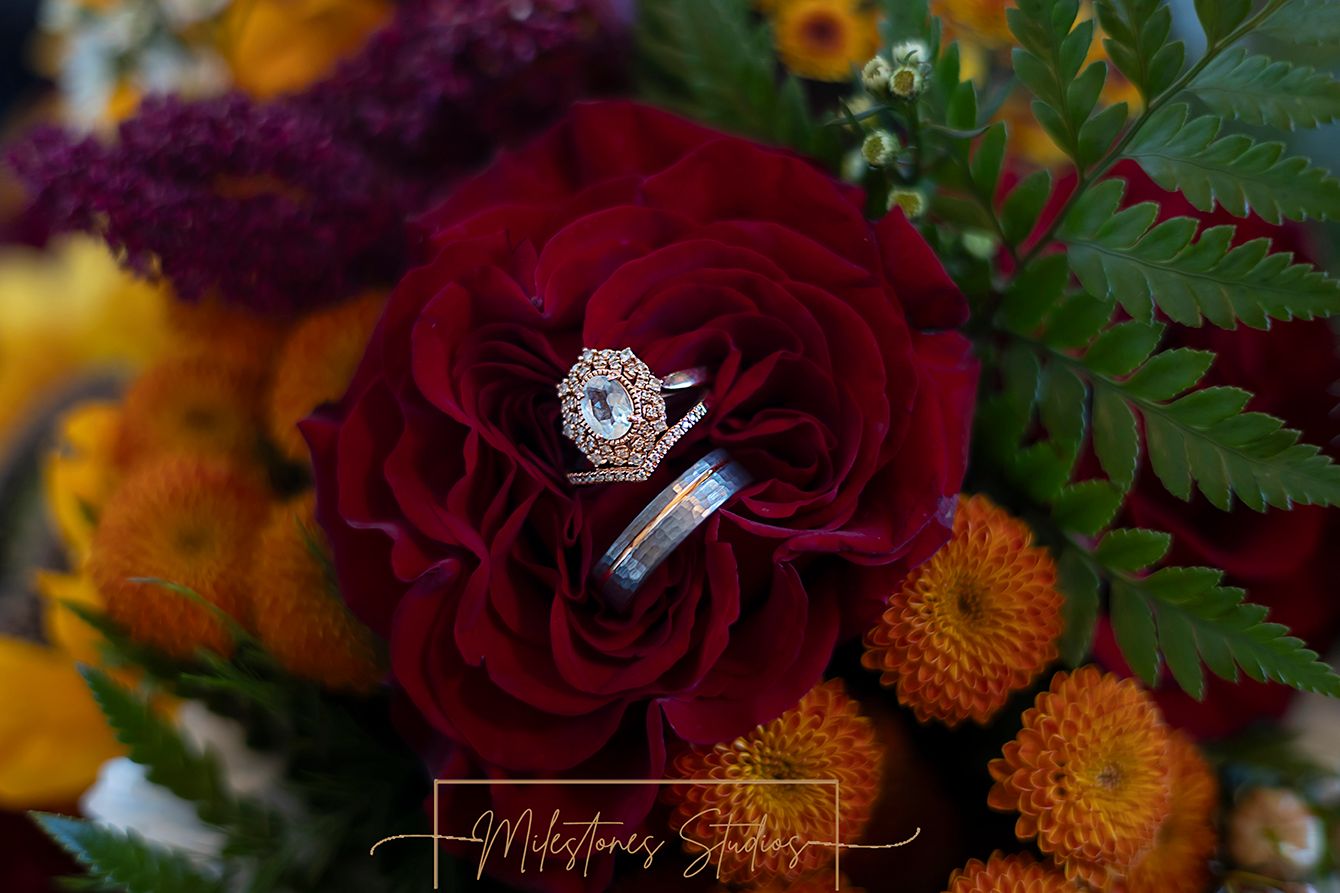 red rose bridal bouquet with rings
