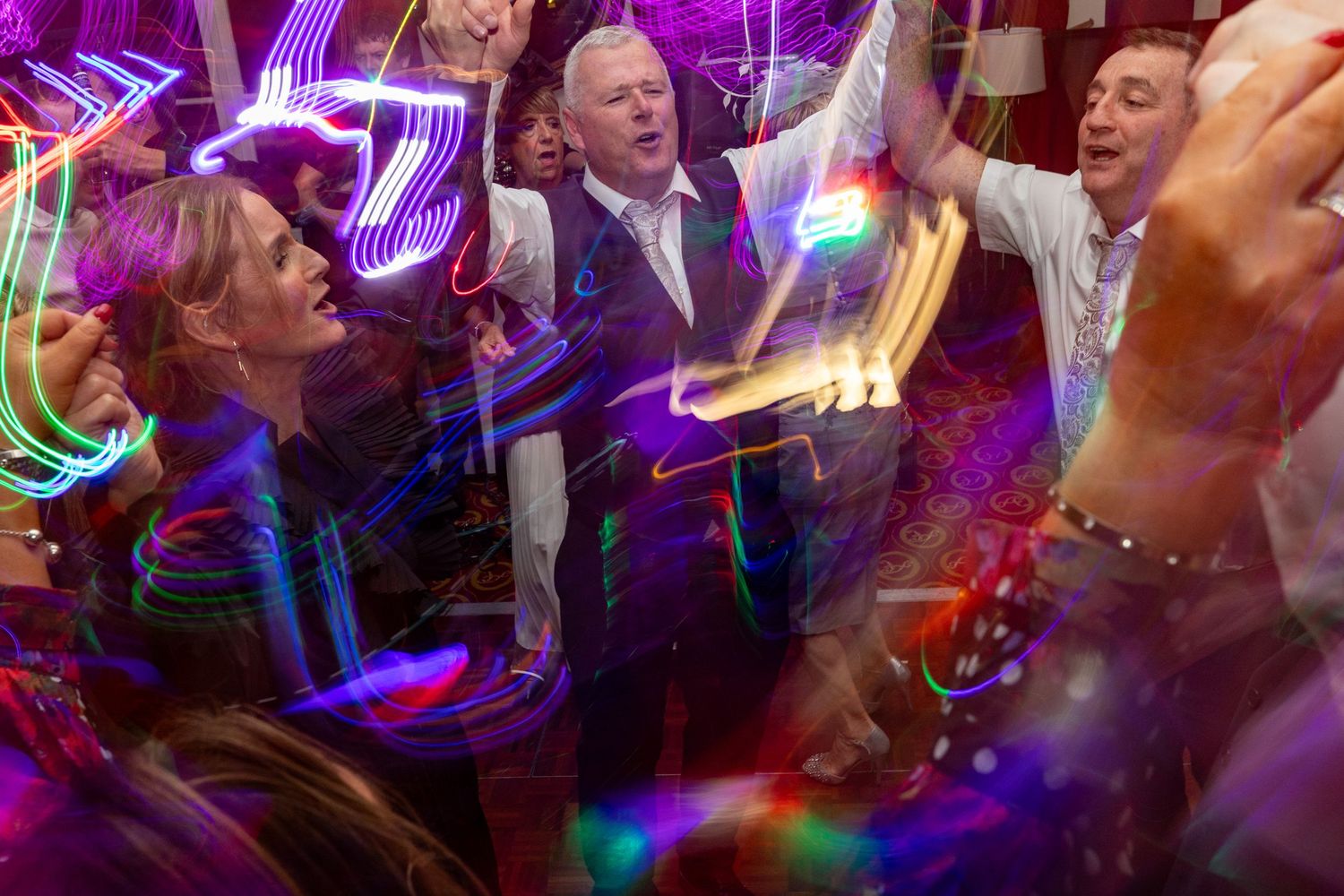 wedding guests on the dance floor at the Athenaeum liverpool. photograph by Stuart Morris Photography