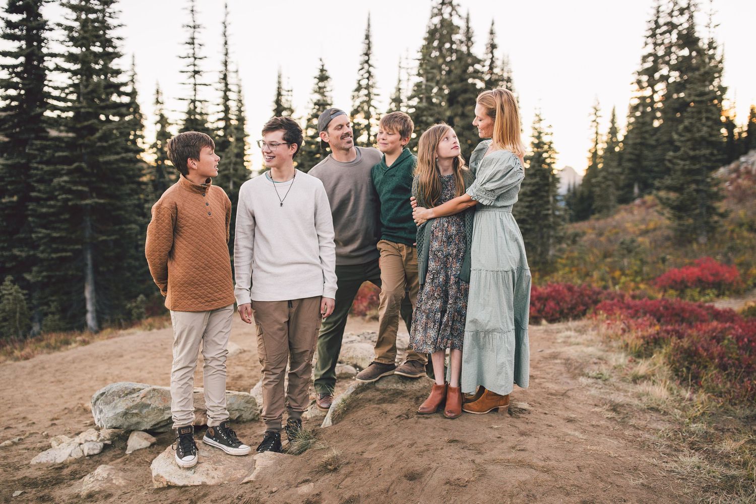 Family all talking together and enjoying each other's company during a family photoshoot in Mt. Rainier National Park in Washington