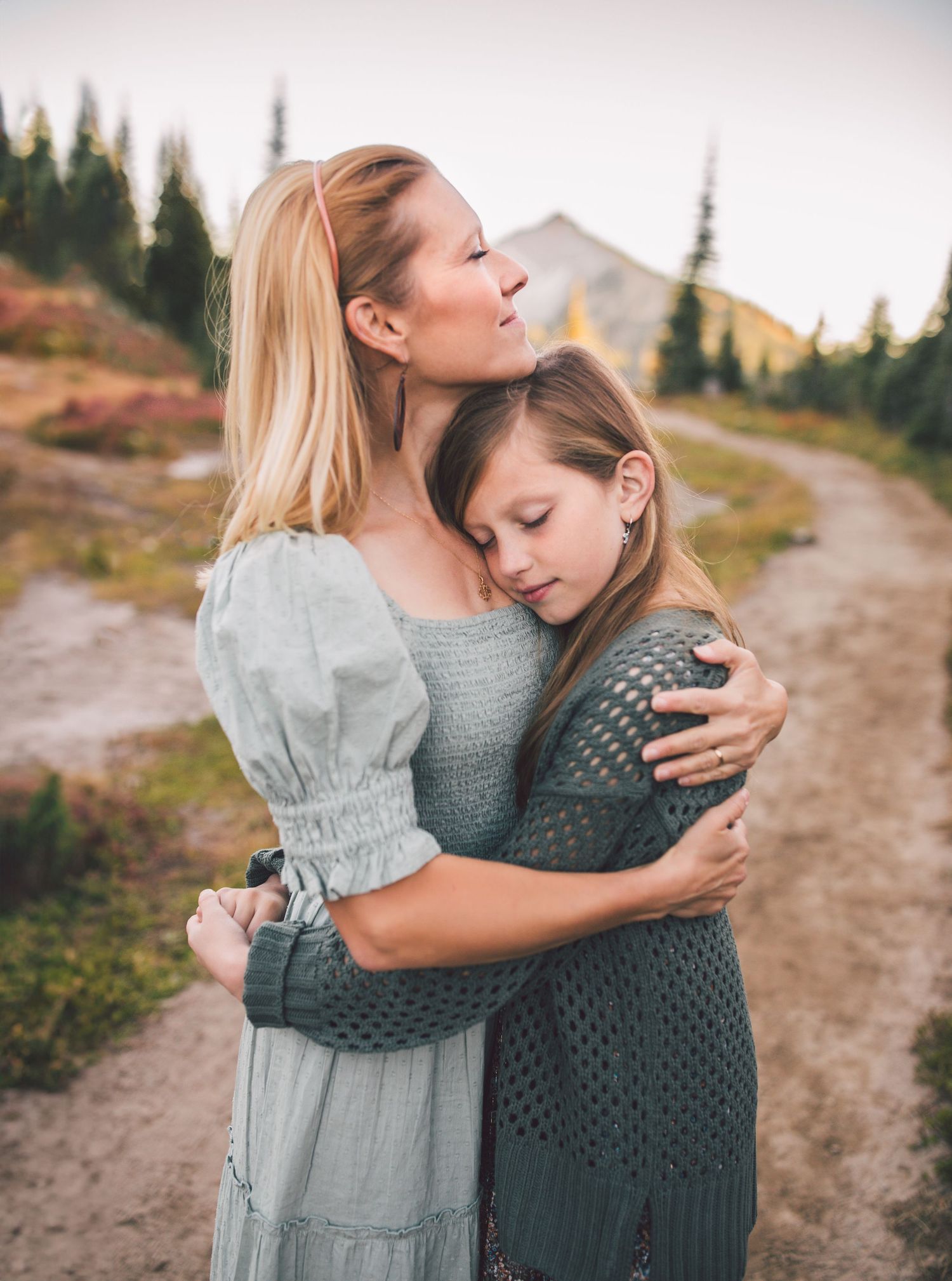 Daughter and mother hugging during a family photoshoot in Mt. Rainier National Park in Washington