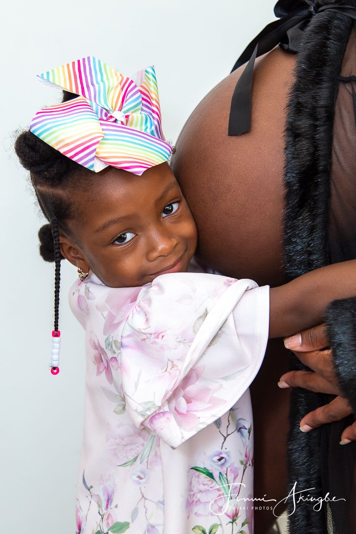 Mother and daughter at-home maternity shoot, captured by Funmi Akingbe for Pataki Photos