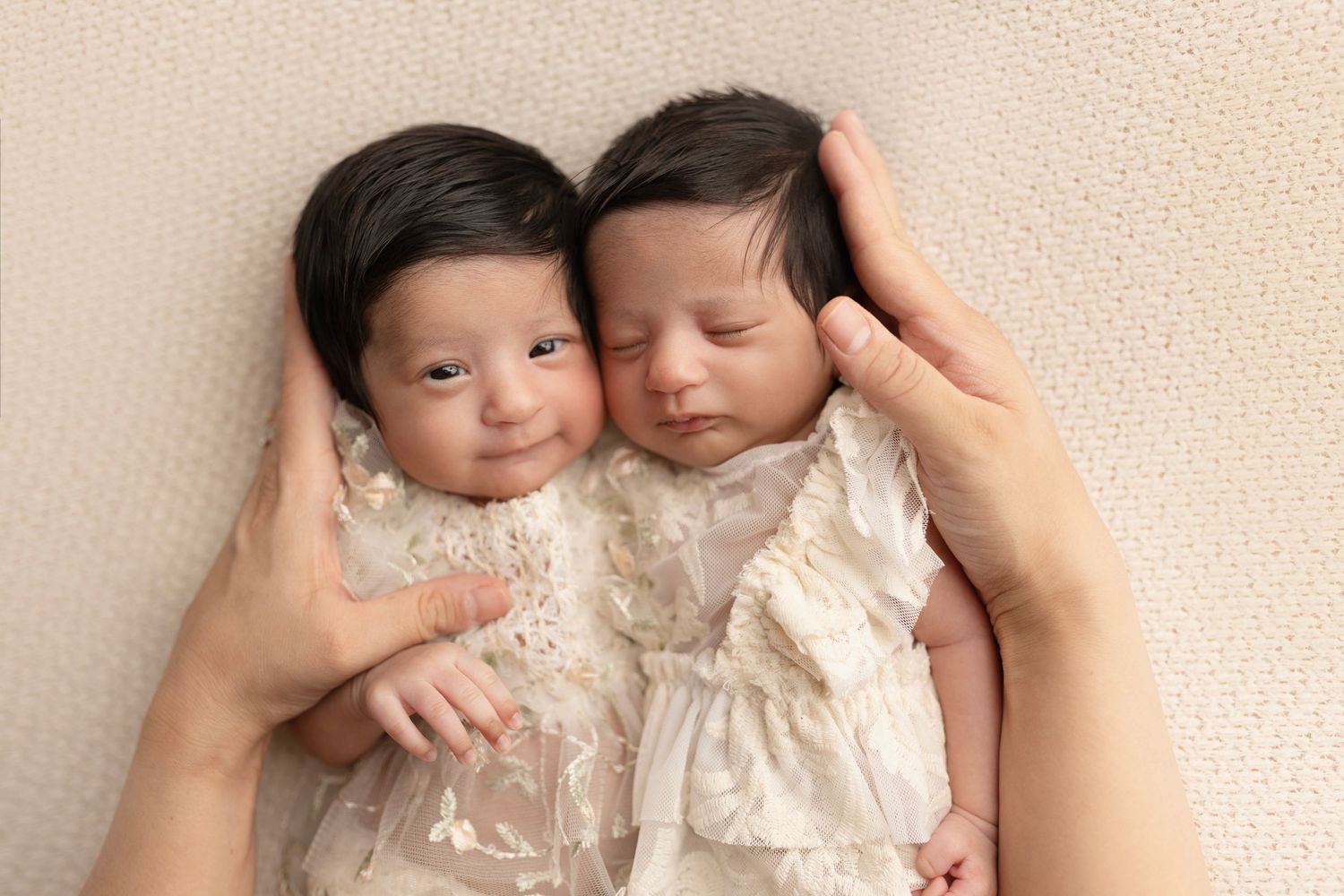 Elizabeth Lang Photography. Twin newborn photography Surrey. two girls