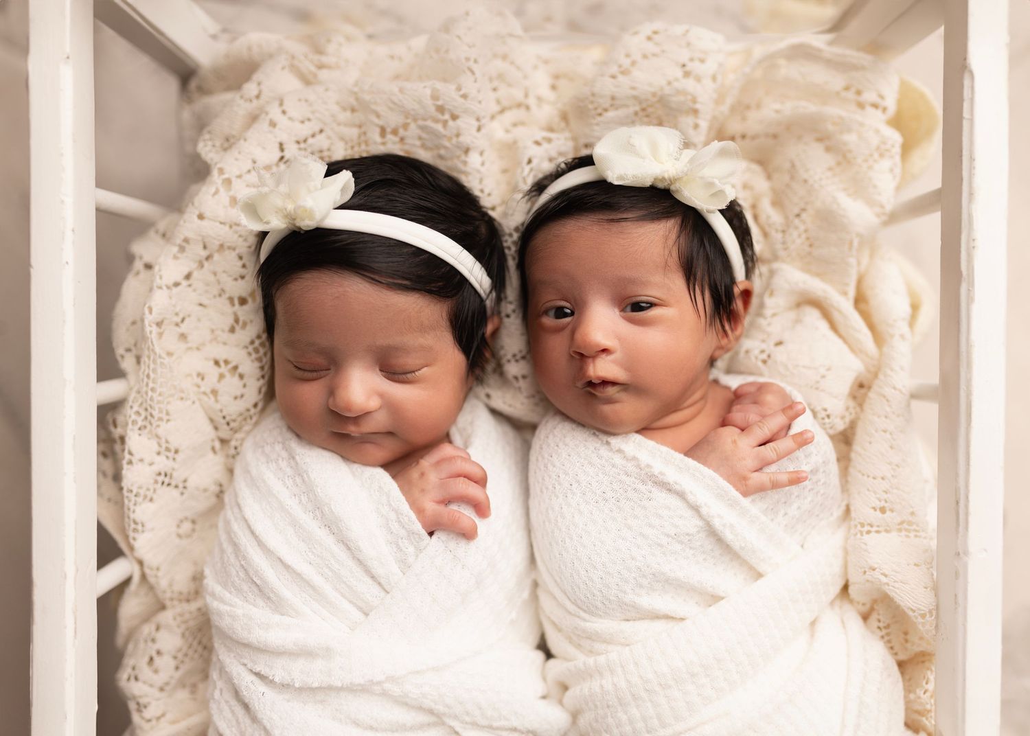 Elizabeth Lang Photography. Twin newborn photography Surrey. twin girls