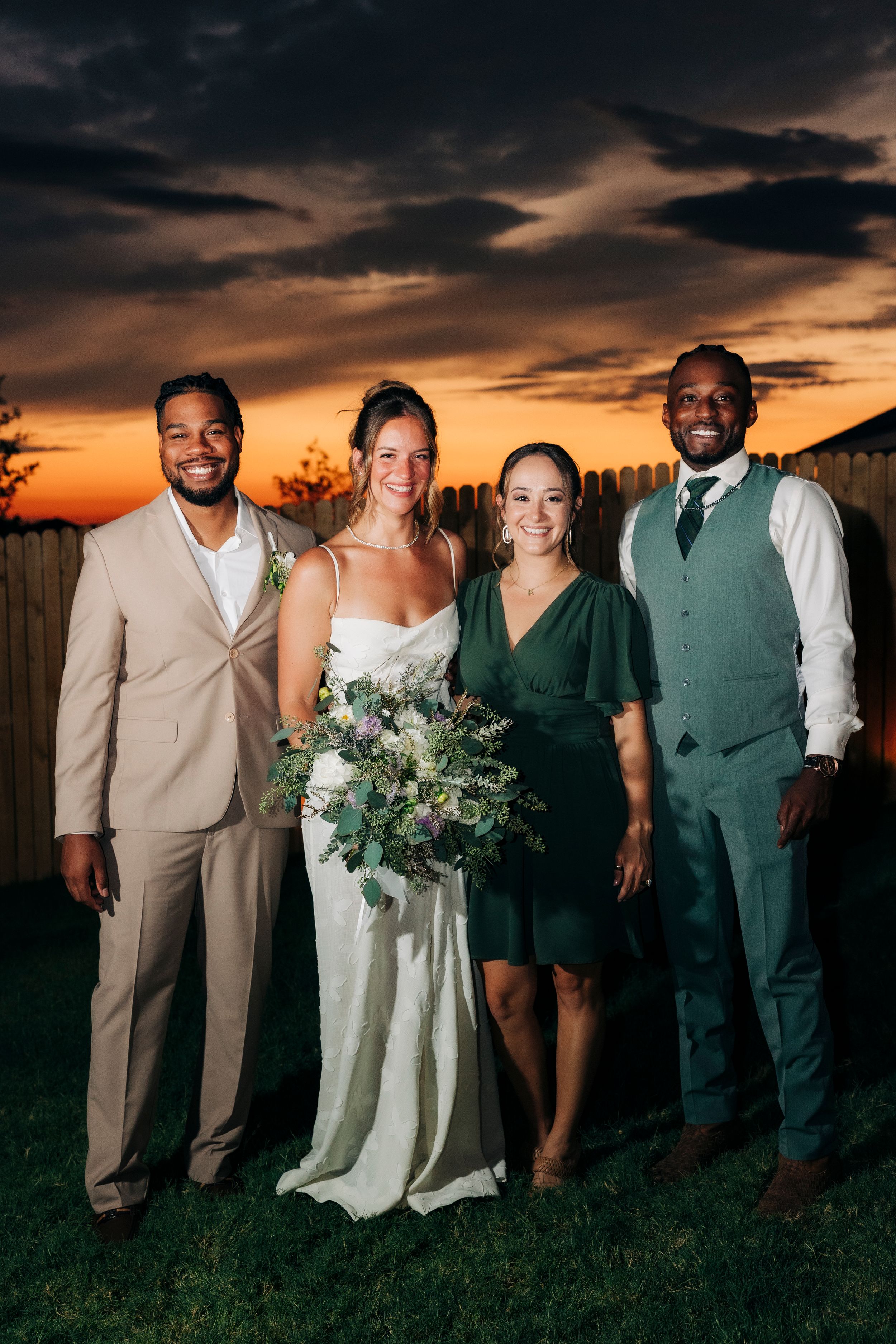 Full family portrait after outdoor backyard ceremony at summer wedding in Fort Worth, Texas