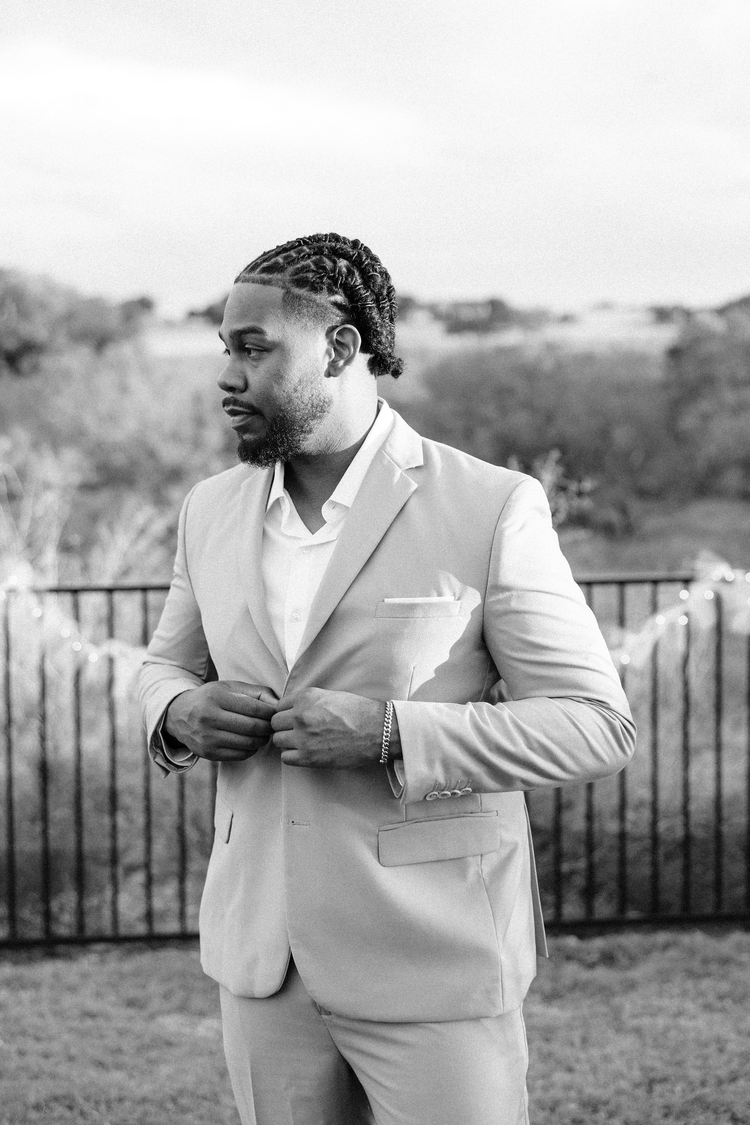 Groom portrait outdoors during golden hour at backyard wedding in Fort Worth